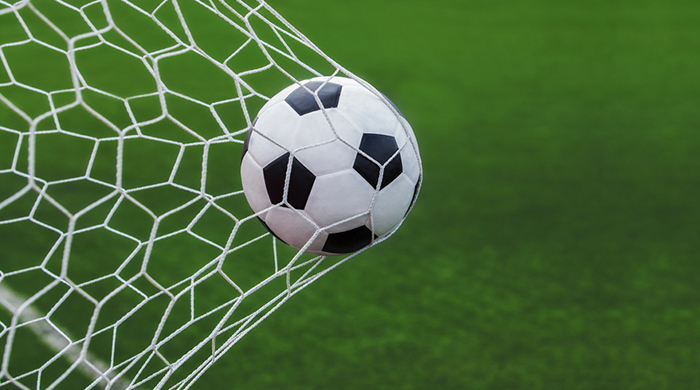 Football match in a stadium